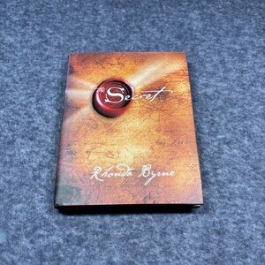 The Secret by Rhonda Byrne — Orange Brown Hardcover